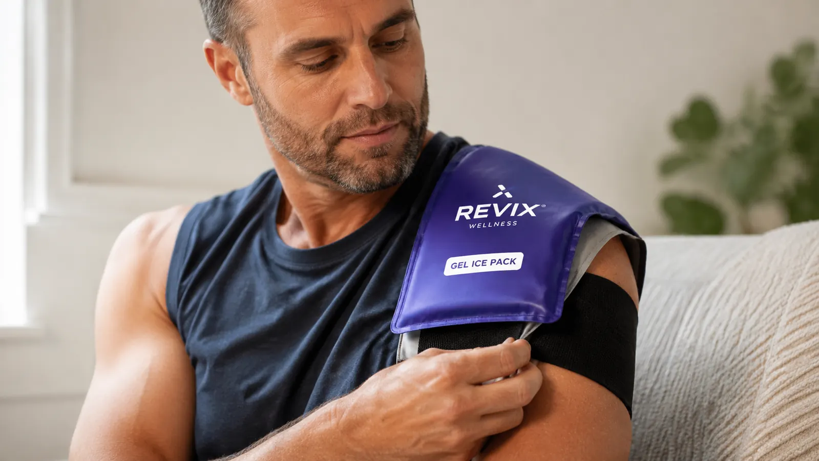 REVIX reusable gel ice pack strapped securely to a person's shoulder over a thin shirt